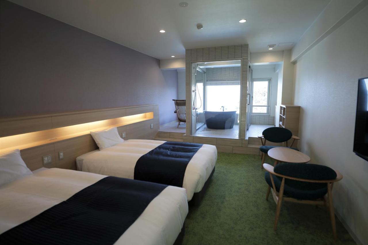 فندق شيزوكافي  فندق إيزوكيو الغرفة الصورة